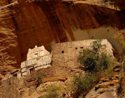 A ruined monastery set in a desert cliff